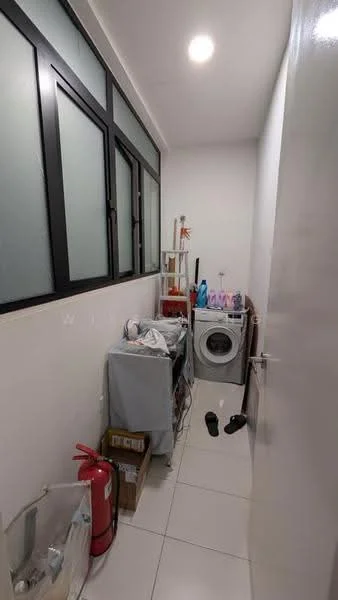 Laundry features: white painted walls, white tiled flooring, floor-to-ceiling windows, washing machine, laundry sink, storage shelves, fire extinguisher, plastic storage boxes, slippers on the floor.