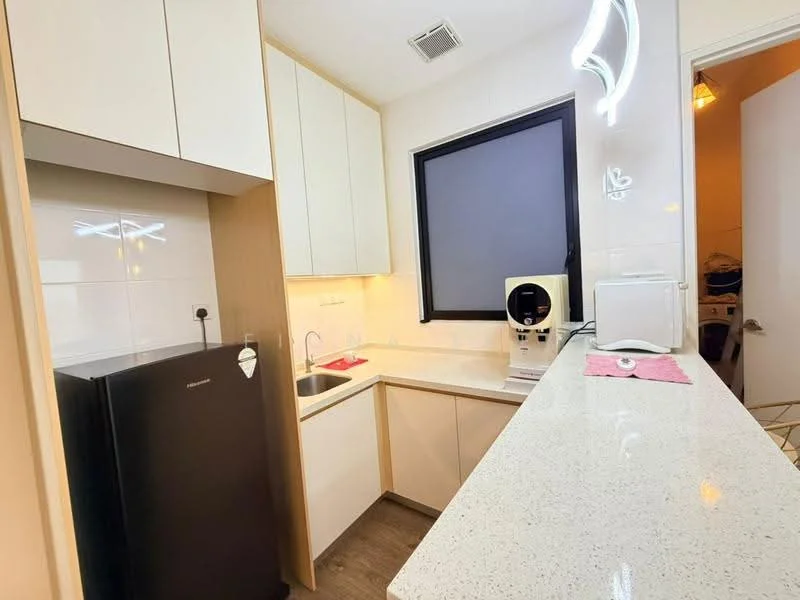 Kitchen features: white cabinetry, granite countertop, single-bowl stainless-steel sink, chrome pull-down faucet, built-in refrigerator, built-in coffee machine, white toaster, under-cabinet lighting, wood-look laminate flooring, black window frame, wall-mounted light fixture; style: modern.