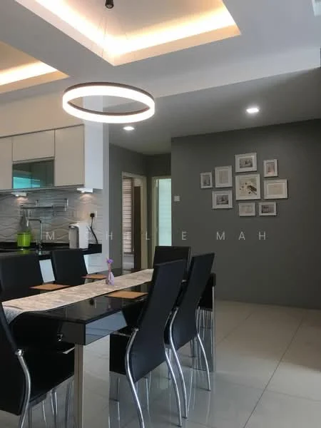 Dining features: rectangular dining table with black glass top, 6 black upholstered dining chairs with chrome legs, pendant light fixture with circular design, white ceiling with recessed lighting, grey accent wall, framed artwork on wall, tile flooring in light color, open kitchen area visible in background; style: modern.