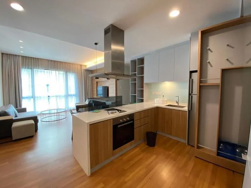 Kitchen features: white cabinetry, wooden cabinetry, marble countertop, stainless-steel sink, chrome pull-down faucet, built-in oven, stainless-steel range hood, 4-burner gas hob, open shelving, refrigerator, pendant lighting, wooden flooring; style: modern. Living features: sofa in grey, coffee table, TV console, floor-to-ceiling windows, curtains, wooden flooring; style: modern.
