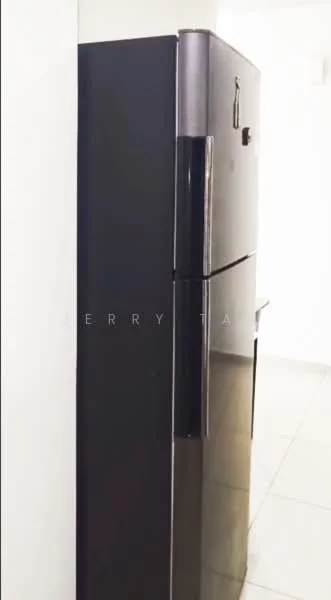 Room features: black fridge.