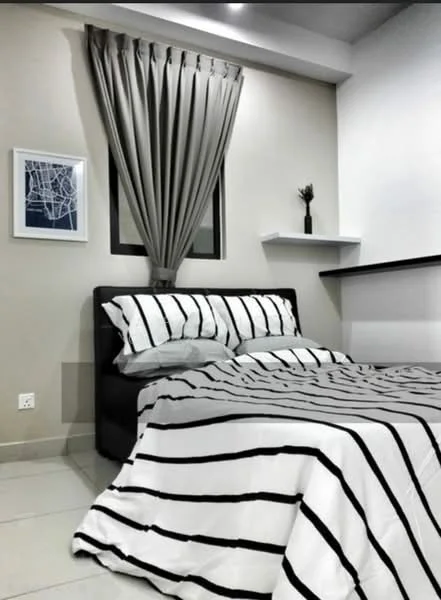 Bedroom features: striped bedding, black upholstered bed frame, grey curtains, wall-mounted shelf, framed artwork on wall, tile flooring, white painted walls, window with view, decorative plant on shelf; style: modern.