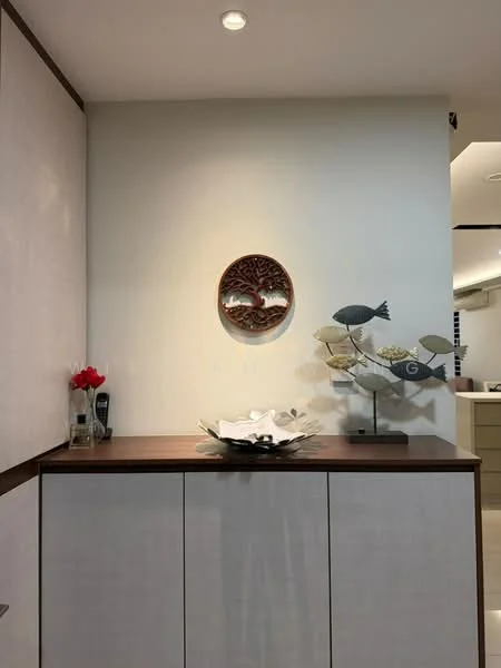 Room features: light-colored walls, wooden countertop, decorative wall art, decorative fish sculpture, vase with flowers, cabinet with white finish, recessed lighting; style: modern.