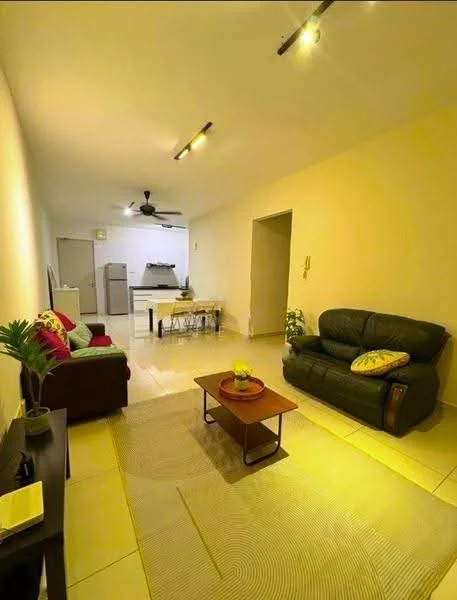 Living features: cream painted walls, tile flooring, 5-blade ceiling fan with light, 2-seater fabric sofa in dark green, 3-seater fabric sofa in red, wooden coffee table, area rug with geometric pattern, decorative plant in ceramic pot, wall-mounted TV, open layout to kitchen, recessed lighting; style: modern.