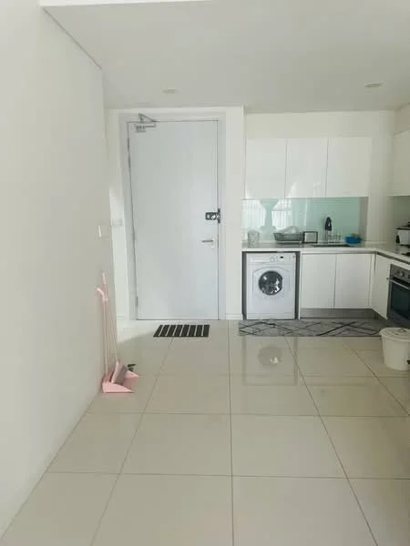 Kitchen features: white cabinetry, light blue backsplash, stainless-steel built-in oven, stainless-steel washing machine, stainless-steel sink, chrome faucet, grey area rug, white tiled flooring, recessed downlights, door to hallway, open layout; style: modern.