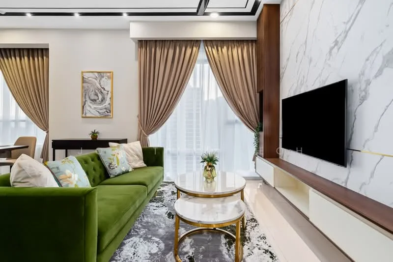 Living features: green velvet sofa, round coffee table with white marble top and gold base, area rug with abstract pattern, wall-mounted TV, feature wall with marble cladding, curtains in beige, framed artwork on wall, recessed ceiling lights, decorative plant on coffee table; style: modern.