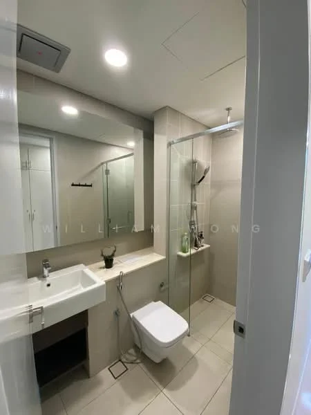 Bathroom features: single-sink vanity with wood cabinet, chrome basin mixer, framed mirror, one-piece toilet, walk-in shower with glass enclosure, rain shower head, tile cladding, light-colored tile flooring, exhaust fan, built-in shelving, wall-mounted accessories; style: modern.