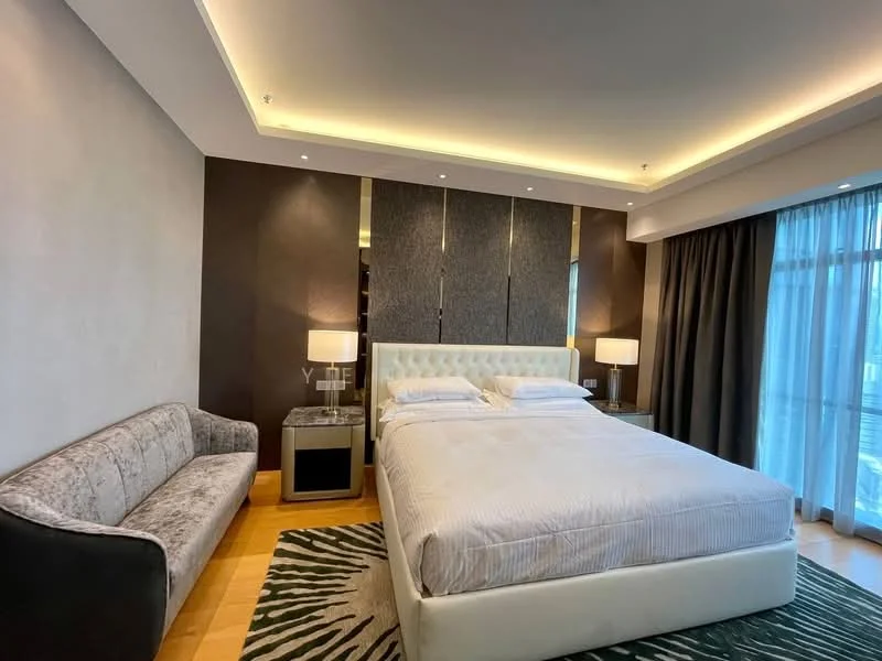 Bedroom features: king-size bed with upholstered headboard, 2 bedside lamps, sofa in light grey fabric, wooden flooring, recessed downlights, floor-to-ceiling windows with sheer curtains, decorative area rug with geometric pattern, wall-mounted artwork, built-in wardrobe with mirrored doors, accent wall with textured finish; style: modern; view: city.