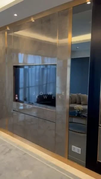Room features: wall-mounted TV, mirrored wall panel, metallic wall finish, built-in cabinetry, soft lighting, neutral color palette, flooring with a polished finish, large windows with sheer curtains; style: modern.