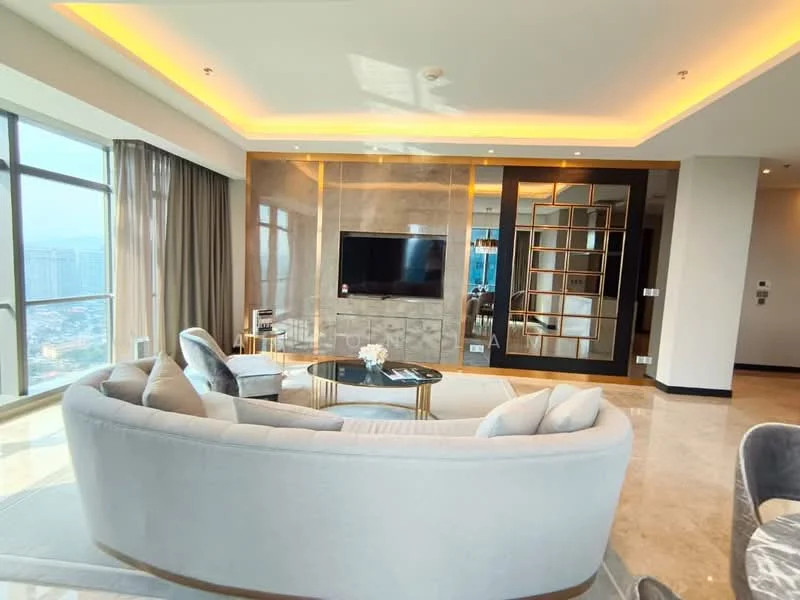 Living features: curved grey fabric sofa, gold coffee table, wall-mounted TV, marble flooring, recessed LED downlights, crown moulding, floor-to-ceiling windows, sheer curtains, decorative wall paneling, accent wall with stone cladding; style: modern; view: city.