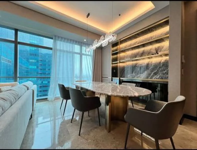 Dining features: marble dining table, 4 upholstered dining chairs in grey, chandelier with multiple light fixtures, floor-to-ceiling windows with sheer curtains, grey accent wall with backlit shelves, polished marble flooring, sofa in light fabric, decorative wall with stone texture; style: modern; view: city.