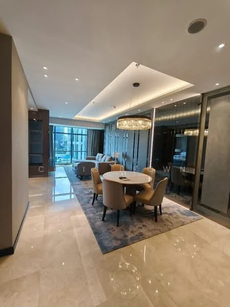 Dining features: round dining table, upholstered dining chairs, chandelier, recessed downlights, marble flooring, decorative area rug, floor-to-ceiling windows, glass wall partition, wall-mounted cabinetry, neutral painted walls; style: modern; view: garden.