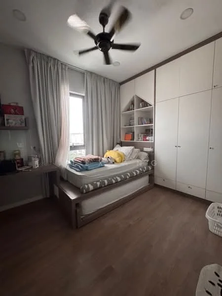 Bedroom features: wooden flooring, light grey painted walls, 5-blade ceiling fan with light, built-in wardrobe with sliding doors, window with sheer curtains, study desk with chair, bed with striped bedding, decorative pillows, bookshelves with books, laundry basket; style: modern.