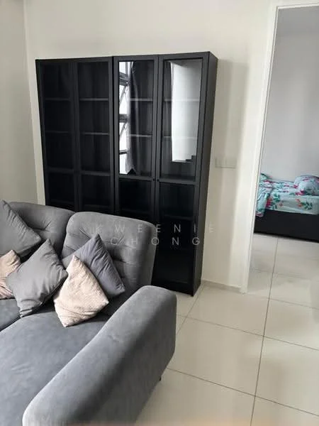 Living features: grey fabric sofa, decorative cushions, black glass-front cabinet, white painted walls, glossy tile flooring, natural light from windows, neutral color palette; style: modern. Room features: bed with floral bedding, white walls, unknown furniture.