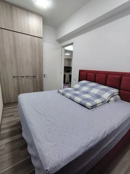 Bedroom features: king-size bed, upholstered headboard in red, plaid blanket, wooden wardrobe with sliding doors, laminate flooring, white painted walls, ceiling lights, doorway leading to another room; style: modern.