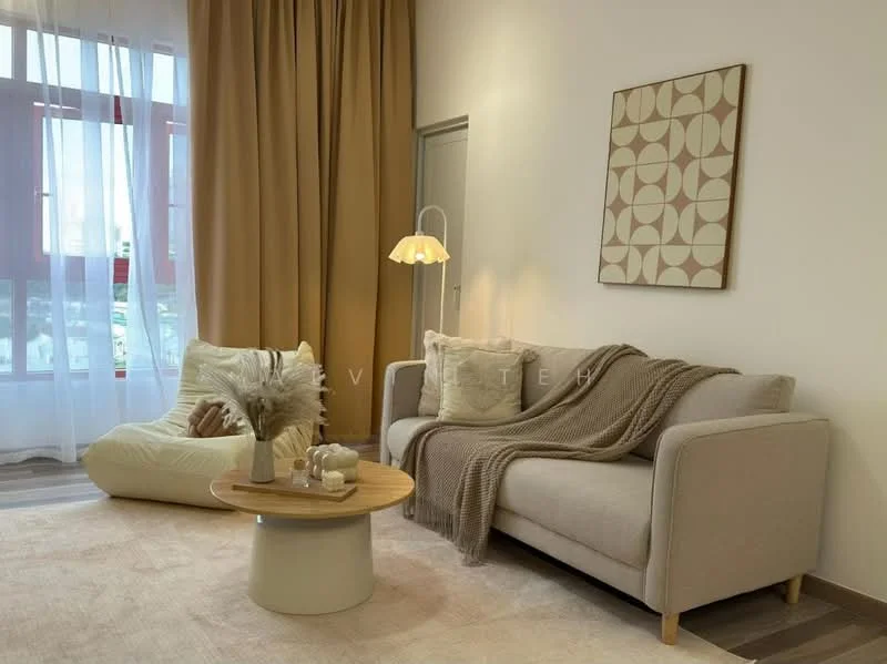 Living features: beige fabric 3-seater sofa, cream accent chair, round wooden coffee table, decorative throw blanket, framed abstract wall art, floor-to-ceiling windows, sheer white curtains, wooden flooring, table lamp with shade, area rug with neutral tones; style: modern; view: city.
