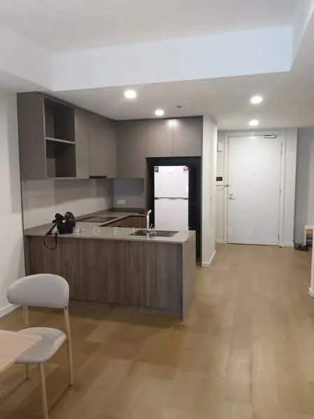Kitchen features: kitchen island with seating, stainless-steel sink, chrome pull-down faucet, grey cabinetry, white countertop, built-in refrigerator, black appliances, wooden flooring, recessed downlights, open shelving, wall-mounted cabinets; style: modern. Room features: entrance door, light switches, wooden flooring.