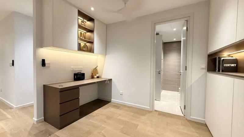 Room features: light wood flooring, white painted walls, built-in cabinetry with open shelving, desk with drawer storage, wall-mounted light fixtures, recessed downlights, doorway leading to bathroom, neutral color palette; style: modern.