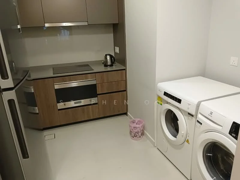 Laundry features: stainless-steel fridge, built-in oven, 4-burner gas hob, kettle, white front-load washing machine, white front-load tumble dryer, wood cabinetry, grey laminate countertop, white walls, tile flooring; style: modern.