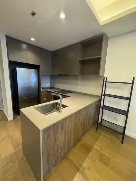 Kitchen features: island countertop with grey stone surface, wooden cabinetry in dark brown, stainless-steel fridge, built-in oven, single-bowl stainless-steel sink, chrome pull-down faucet, open shelving unit, recessed downlights, wooden flooring, grey backsplash, modern design; style: modern.