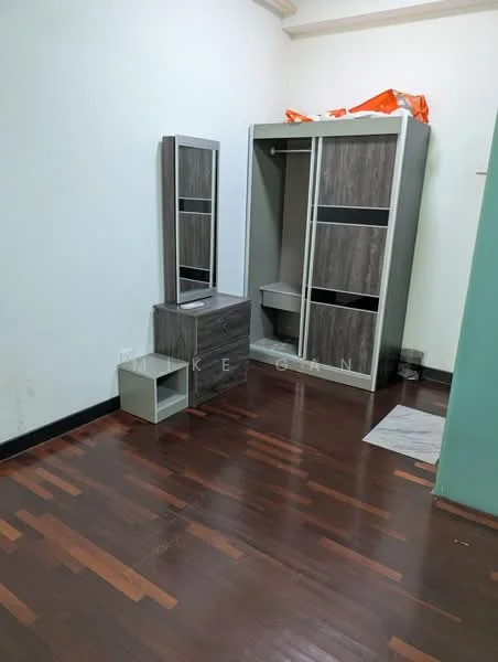 Bedroom features: dark wood flooring, white painted walls, built-in wardrobe with grey finish, mirror with frame, small bedside table, empty space for additional furniture, light source from ceiling, corner with light green wall; style: modern.