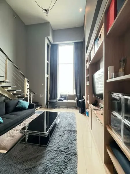 Living features: grey painted walls, high ceiling, floor-to-ceiling windows, black coffee table, 3-seater fabric sofa in black, decorative cushions in teal, area rug with shaggy texture, built-in shelving unit, wall-mounted TV, recessed downlights, curtains in dark fabric, light-colored flooring; style: modern; view: city.