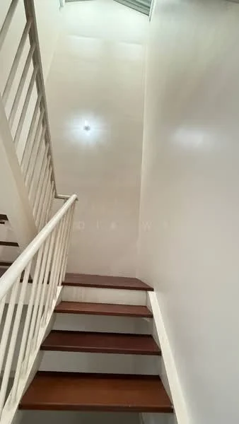 Room features: white painted walls, wooden staircase, handrail, skylight, laminate flooring, natural light from skylight; style: modern.