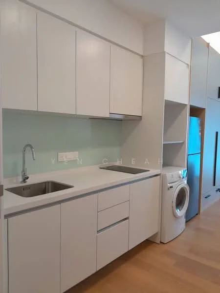 Kitchen features: white flat-panel cabinets, light grey quartz countertop, single-bowl stainless-steel sink, chrome pull-down faucet, built-in washing machine, refrigerator, light green glass backsplash, wooden flooring; style: modern.