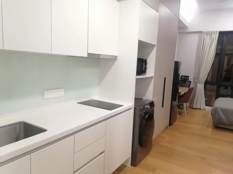 Kitchen features: white cabinetry, stainless-steel sink, built-in stove, white countertop, built-in microwave, washing machine, wooden flooring, light-colored backsplash, recessed lighting; style: modern. Room features: grey bed, desk with chair, floor-to-ceiling windows, curtains.