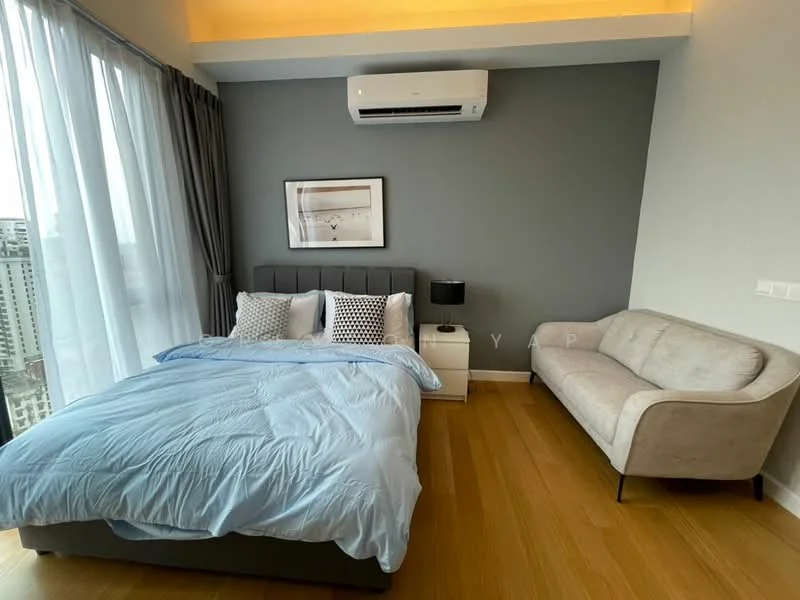 Bedroom features: king-size bed with light blue bedding, upholstered headboard, nightstand with lamp, sofa in light grey fabric, floor-to-ceiling windows with sheer curtains, wooden flooring, wall-mounted air conditioning unit, framed artwork on wall, grey accent wall, decorative pillows; style: modern; view: city.