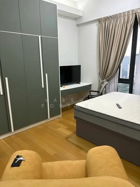 Bedroom features: queen-size bed, upholstered headboard, built-in wardrobe with grey panels, wooden flooring, desk with chair, wall-mounted TV, floor-to-ceiling window, curtains, decorative items on desk; style: modern; view: city.