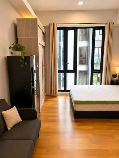 Bedroom features: queen-size bed, upholstered headboard, wooden flooring, floor-to-ceiling windows, sheer curtains, built-in wardrobe, sofa in grey fabric, nightstand with lamp, decorative plant; style: modern; view: city.