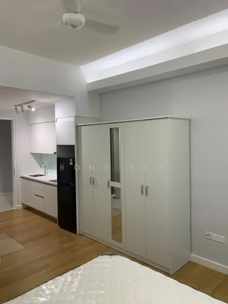 Room features: white painted walls, wooden flooring, ceiling fan, built-in wardrobe with mirrored doors, kitchenette with cabinets, black refrigerator, under-cabinet lighting, recessed ceiling lights; style: modern.