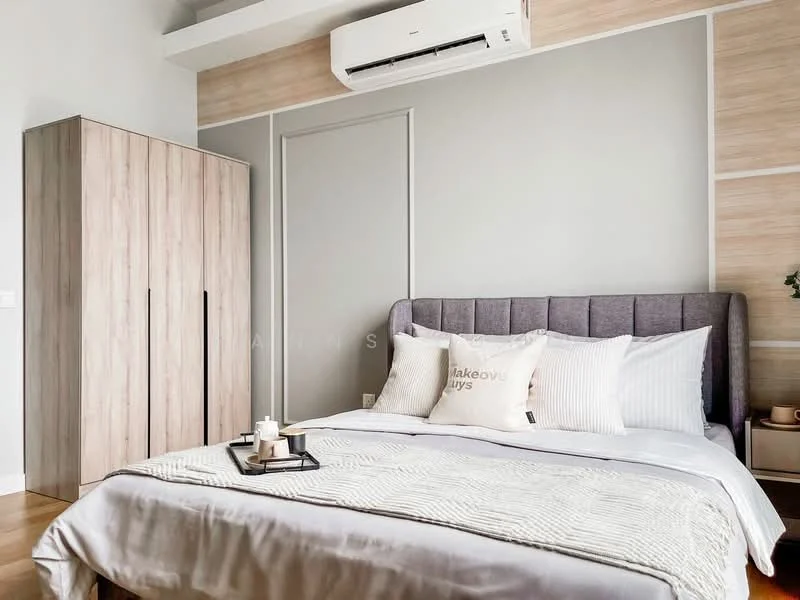 Bedroom features: king-size bed with upholstered headboard, white bedding with decorative pillows, wooden flooring, built-in wardrobe with wood finish, wall-mounted split AC unit, neutral painted walls, decorative wall paneling, bedside table with decorative items; style: modern.