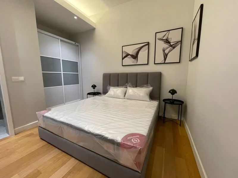 Bedroom features: queen-size bed with grey upholstered headboard, two bedside tables, framed artwork on walls, wooden flooring, built-in wardrobe with sliding doors, white painted walls, recessed lighting, decorative table lamps; style: modern.