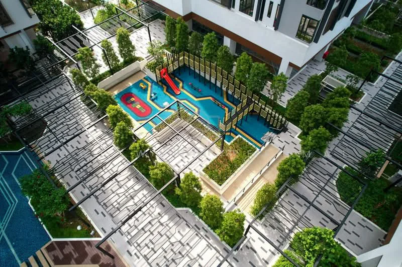 Exterior type: landscape garden; features: swimming pool with water slide, children's play area, manicured landscaping, paved walkways, lattice trellis structures, greenery with shrubs and trees, pool deck with loungers, outdoor seating areas; style: modern.