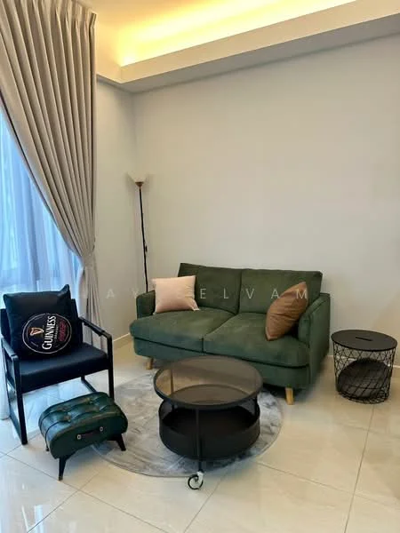 Living features: green fabric sofa, black armchair with logo, round glass coffee table, white marble flooring, floor lamp, curtains, decorative throw pillows, area rug; style: modern.