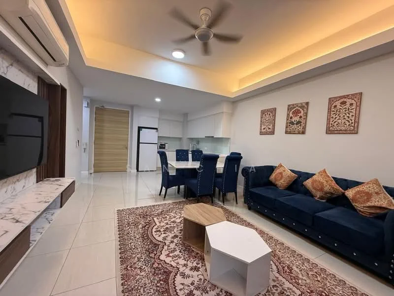 Living features: 5-blade ceiling fan with light, wall-mounted TV, marble feature wall, blue fabric sofa with decorative cushions, coffee table with wooden top, area rug with geometric pattern, dining table with 6 upholstered chairs, recessed lighting, white ceiling with ambient lighting, white tiled flooring; style: modern. Kitchen features: white cabinetry, stainless-steel fridge, built-in oven, ceramic cooktop, white countertops, open-plan layout; style: modern.