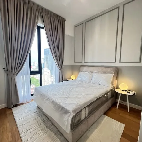 Bedroom features: queen-size bed with upholstered headboard, white bedding, two bedside tables, table lamps with round shades, floor-to-ceiling windows, grey painted walls, decorative wall paneling, wooden flooring, area rug, curtains, city view; style: modern; view: city.