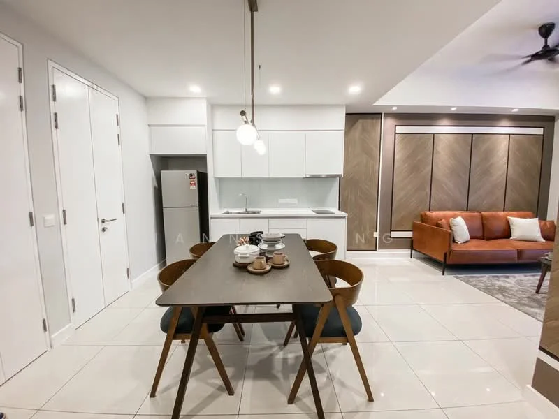 Dining features: 6-seater dining table, wooden dining chairs, white cabinetry, stainless-steel fridge, ceramic tile flooring, recessed downlights, pendant light fixture, open-plan layout, grey accent wall, sofa in living area visible; style: modern.
