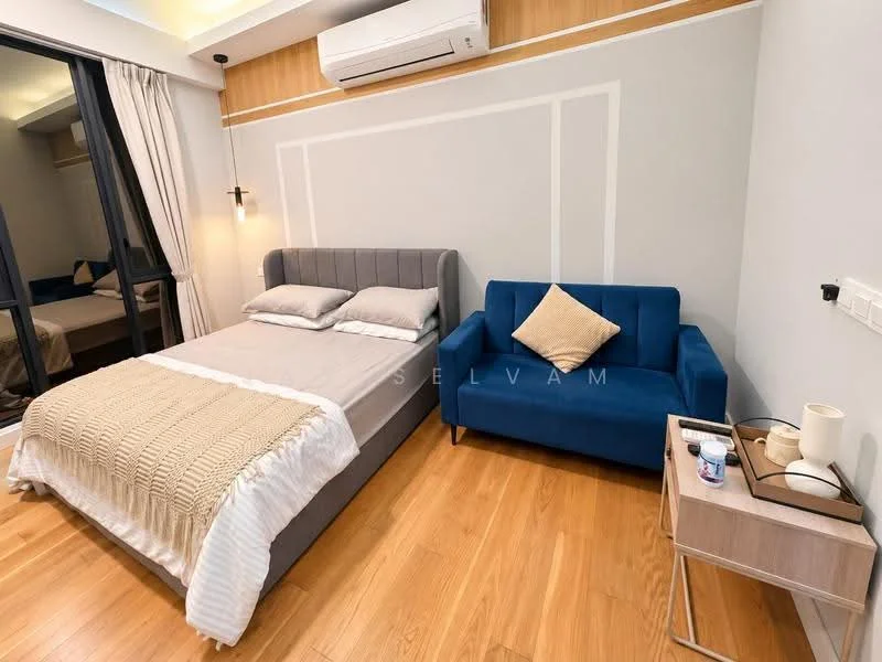 Bedroom features: queen-size bed with grey upholstered headboard, bedding with beige and white coverlet, blue fabric sofa, wooden bedside table, table lamp, wall-mounted air conditioning unit, light wood flooring, decorative cushion on sofa, neutral painted walls, recessed ceiling lights; style: modern.