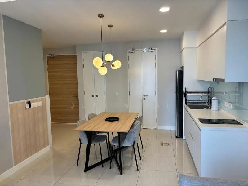 Dining features: 4-seater dining table, grey upholstered dining chairs, pendant light fixture with multiple bulbs, white cabinetry, black refrigerator, built-in kitchen countertop, stainless-steel sink, chrome faucet, ceramic tile flooring, white walls, light grey accent wall, door to hallway, double doors to entrance; style: modern.
