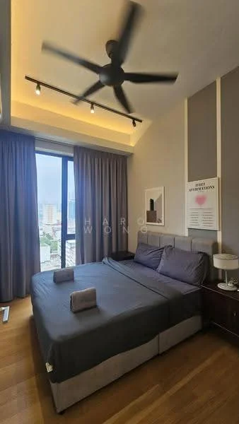 Bedroom features: king-size bed, upholstered headboard, grey bedding, 2 grey towels on bed, wooden bedside table, table lamp on bedside table, floor-to-ceiling window, curtains in grey, ceiling fan with 5 blades, recessed lighting, wooden flooring, decorative wall art; style: modern; view: city.