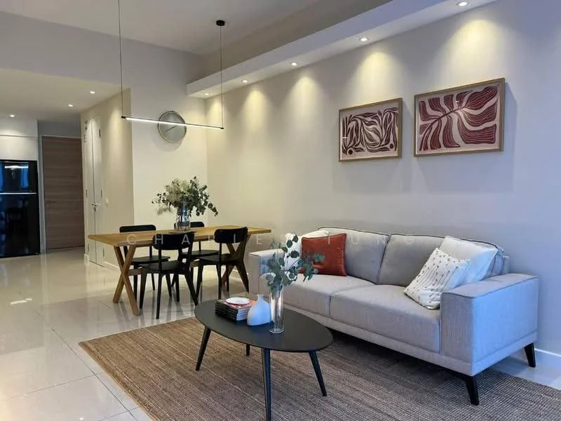 Living features: light grey fabric sofa, black coffee table, area rug with geometric pattern, framed artwork on walls, recessed LED downlights, pendant light fixture, decorative vase with greenery, wall-mounted clock; style: modern. Dining features: wooden dining table with angled legs, 4 black dining chairs, decorative centerpiece on table; style: modern.