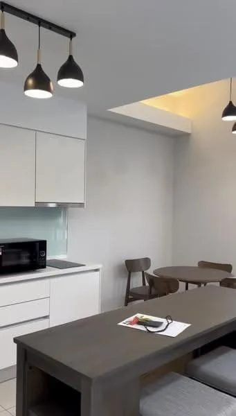 Kitchen features: white cabinetry, grey countertop, stainless-steel sink, built-in microwave, 4-burner gas hob, pendant lighting, dining table, wooden dining chairs, light grey walls, tile flooring; style: modern.