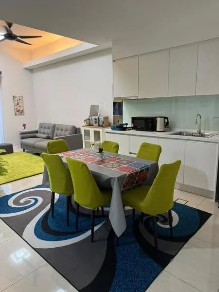 Dining features: 6-seater dining table with patterned tablecloth, green upholstered dining chairs, area rug with abstract pattern, pendant light above dining table, white cabinetry, stainless-steel sink, built-in microwave, freestanding range oven, grey fabric sofa, decorative wall art, recessed ceiling lighting, open-plan layout; style: modern.