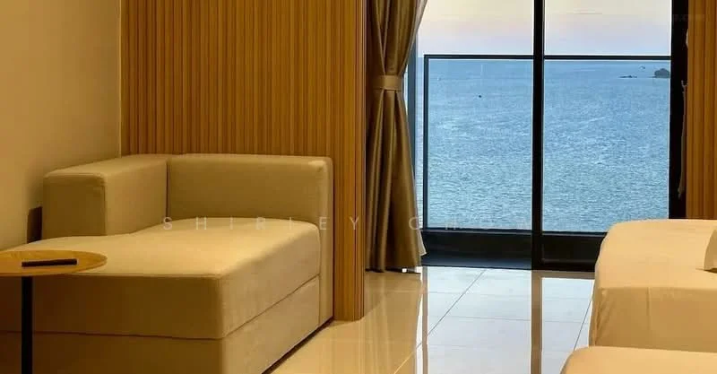 Room features: beige fabric sofa, small round side table, floor-to-ceiling windows, sliding glass door, curtains, white walls, marble tile flooring, sea view; style: modern; view: sea.