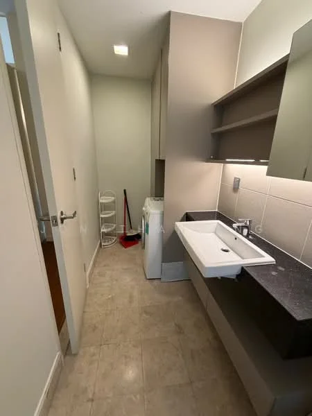Laundry features: single-bowl sink, black countertop, white washing machine, light grey walls, cream tiled flooring, built-in shelving, overhead cabinets, recessed lighting; style: modern.