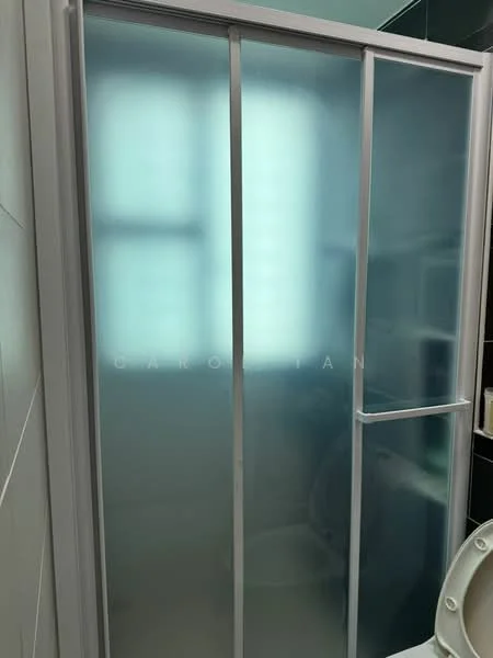 Bathroom features: glass shower enclosure, sliding shower doors, white tiled walls, black tiled flooring, toilet, sink, window, chrome fixtures; style: modern.