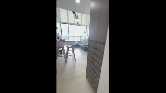 Room features: light wood flooring, large floor-to-ceiling windows, open layout, modern pendant light fixture, neutral wall color, built-in cabinetry, sofa, dining table with chairs; style: modern; view: city.